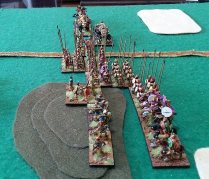After the initial contact; the psiloi and half a phalanx on the Spartan left wing have vanished. Philip and his light horse have extended their left flank after the loss of their medium foot.